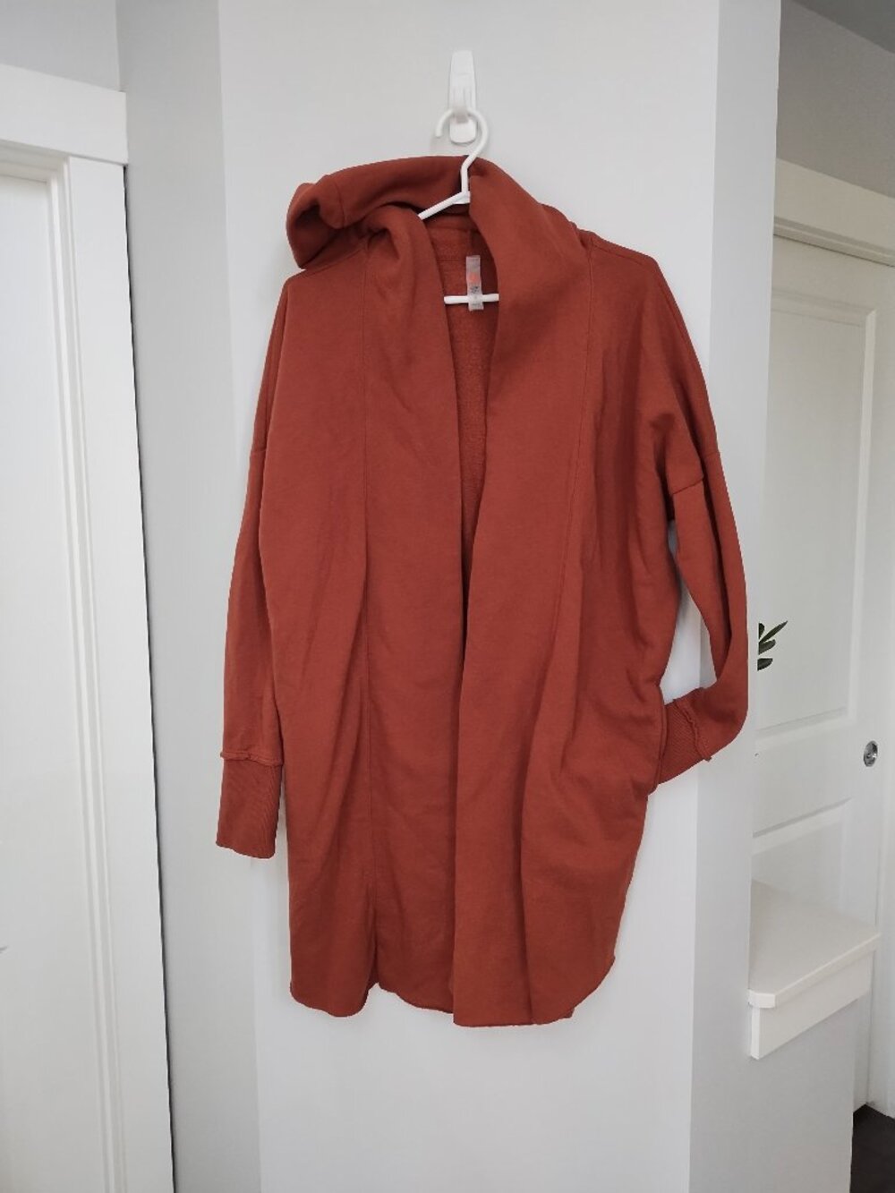 Cozy longer hooded Mono B cardigan with pockets
